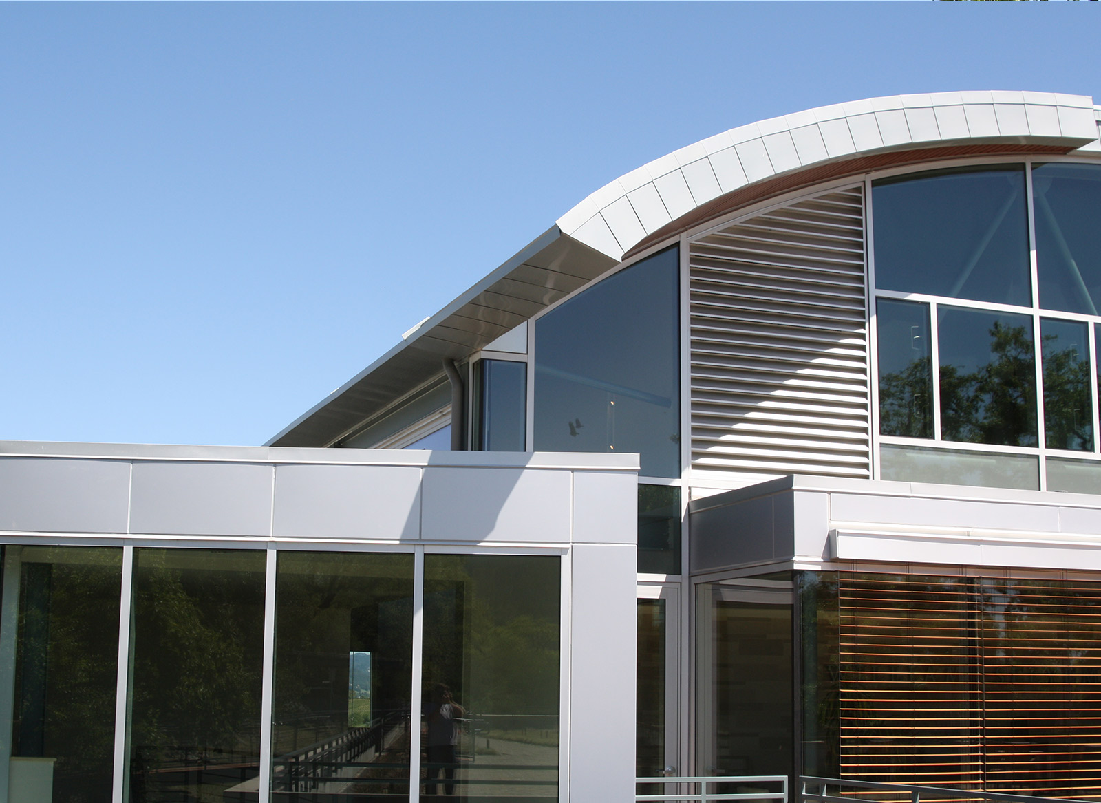 curved metal roof and metal siding